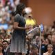 First Lady of the United States Michelle Obama speaking with supporters of former Secretary of State Hillary Clinton at a campaign rally at the Phoenix Convention Center in Phoenix, Arizona.